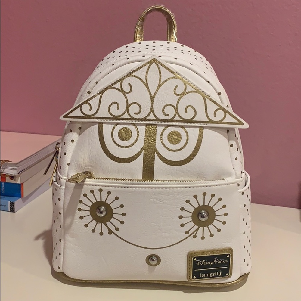 Small world Loungefly backpack .